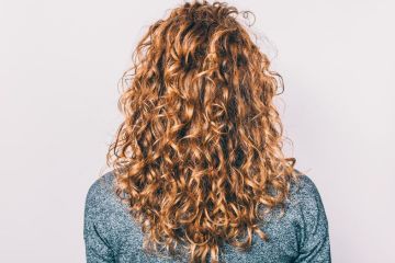 Rear view of young woman with long hair